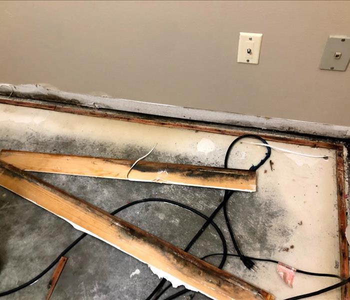 mold found behind baseboards after an inspection for mold